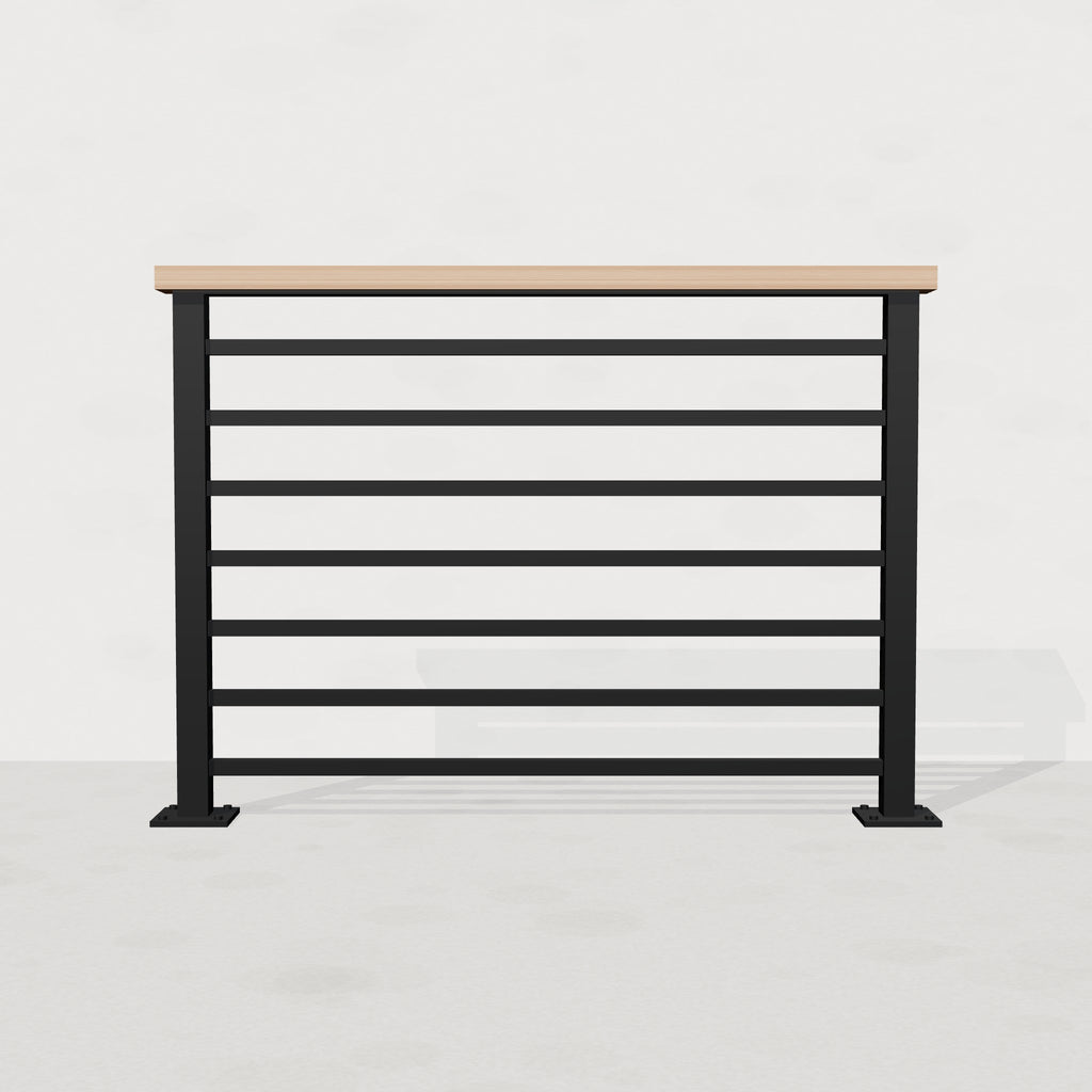 Black steel horizontal stair railing with white oak top rail, front view