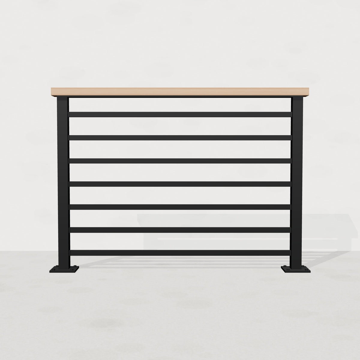 Black steel horizontal stair railing with white oak top rail, front view